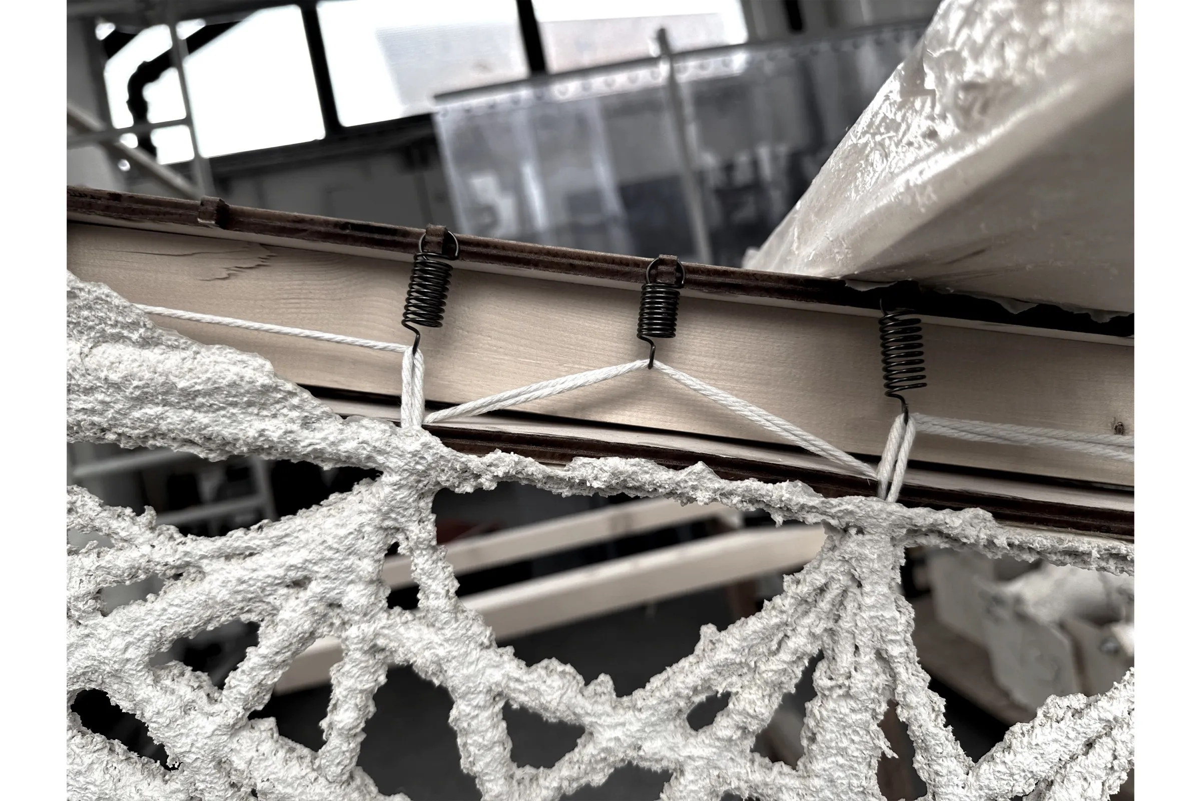 Detail view of the sprayed cellulose surface texture.